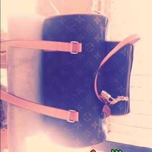 A Louis Vuitton Purse...only used for a hour...