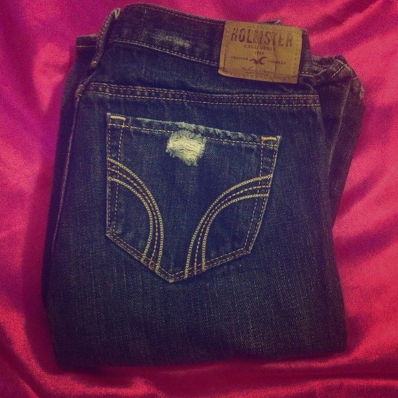 Hollister 0R ripped dark wash jeans.