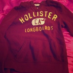 Burgundy Hollister hoodie with gold lettering