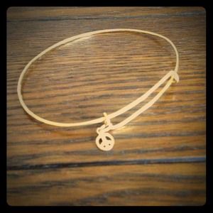 14k gold plated expandable bracelet.