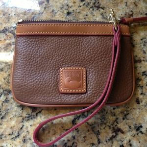 Authentic Dooney & Bourke wristlet.