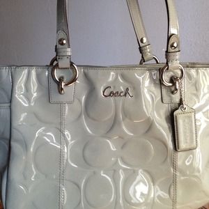 Grey patent coach bag