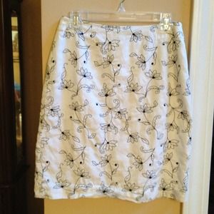 White pencil skirt w/ black floral stitching
