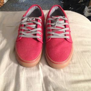 mens, red shoe with grey laces and brown bottom
