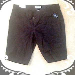 New, black Bermuda shorts.