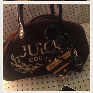 Brown and gold used Juicy Couture hand bag
