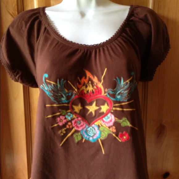 Ivy Jane brown top with colorful embroidery.