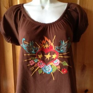 Ivy Jane brown top with colorful embroidery.