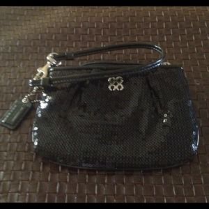 Black sequined Coach wristlet