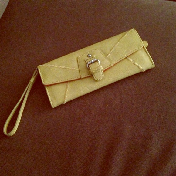 Yellow Nine West wrist purse