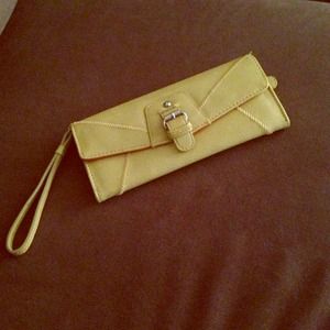 Yellow Nine West wrist purse