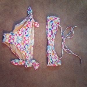 M Coach baiting suit never worn