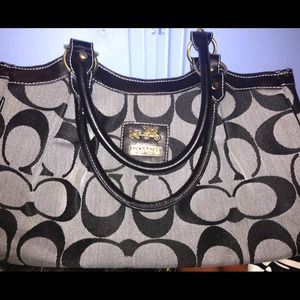 Large handbag - a few small tears.