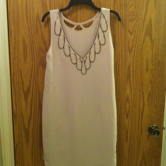 Sexy fitted dress. Deep V in the back.