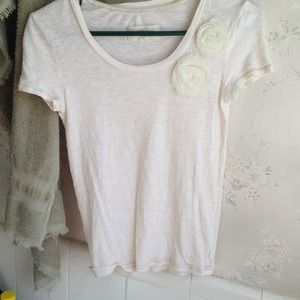 White-champagne tee with rose detail at shoulder