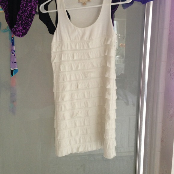 Fun white dress with frill accents