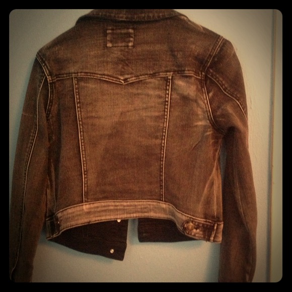 Faded black denim jacket.