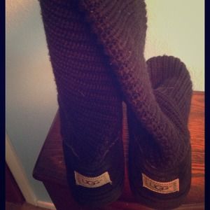Black knit UGG boots.