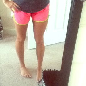 Under armour neon pink and green running shorts
