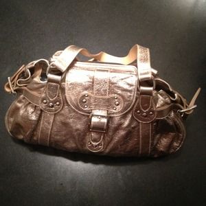 gently used gold longchamp bag