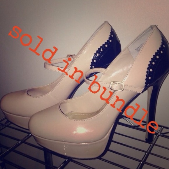 Nude and black pumps