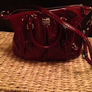 Medium cranberry Coach purse