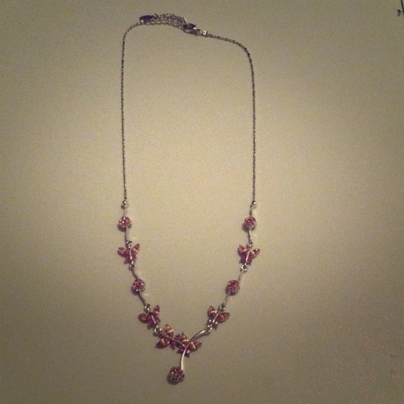 Silver necklace with pink flowers and butterflies