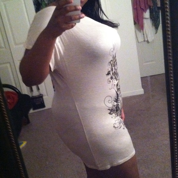 Brown shirt dress with flowers on it. Worn once :)