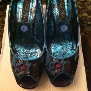 Teal and black Devil wedge heels