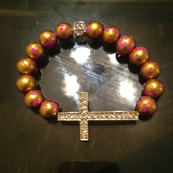 Sparkling side cross bracelet.