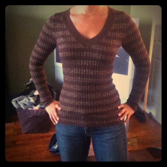 Brown and gold Express shirt.