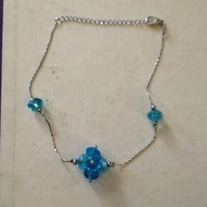 Silver look and blue crystal ankle bracelet.