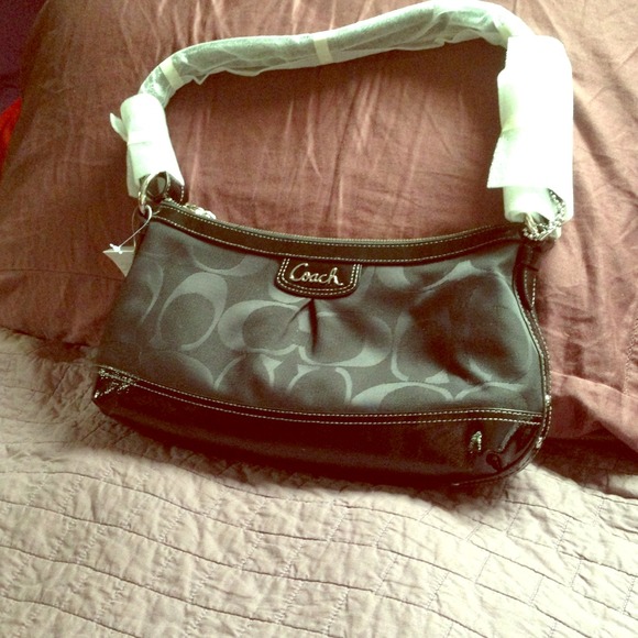 😃😃😉SOLD😃😃😃 Authentic and New Coach Signature