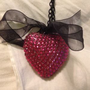 Heart necklace on hold