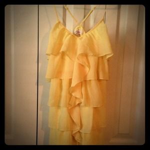 Brand new racer back ruffle top