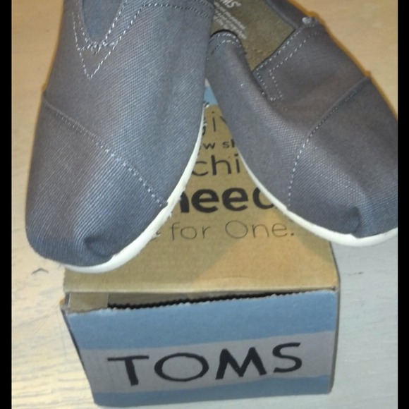 Brand New, never worn grey Toms!!