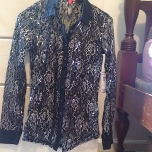 Sheer black long sleeve button up shirt.