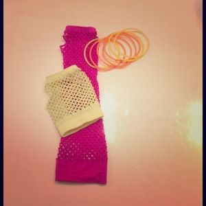 Two neon gloves and neon bracelets