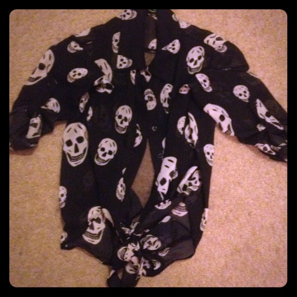 A black skull see through shirt