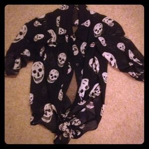 A black skull see through shirt