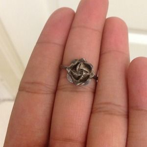 Silver flower ring.