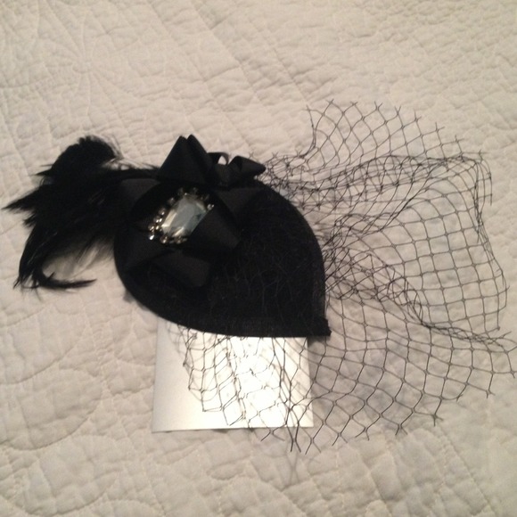 Black fascinator with feathers jewel and bird cage