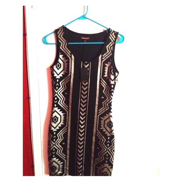 Bodycon tribal print dress.