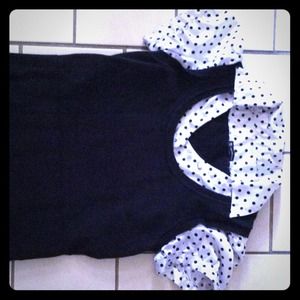 White and black polka dot shirt