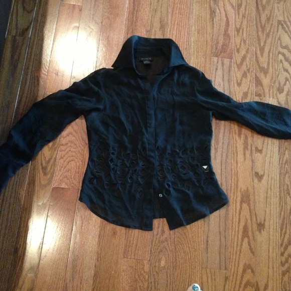 The limited 100 percent silk cut out blouse