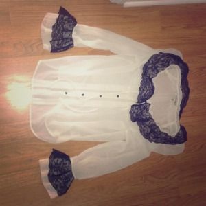 Andrew Charles ivory and black blouse