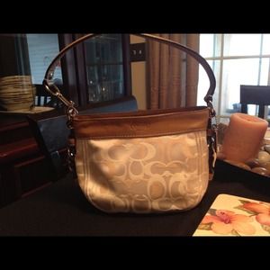 New (never been used) authentic coach purse