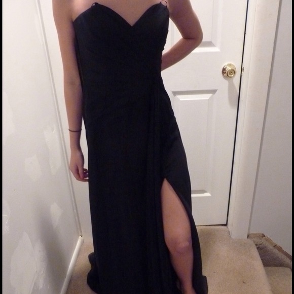 Black strapless gown with thigh high slit