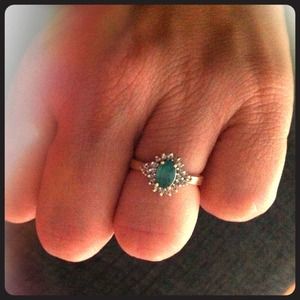 14 CT Emerald Stone w/ 3 rows of diamonds..