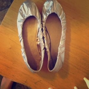 Metallic silver flats.